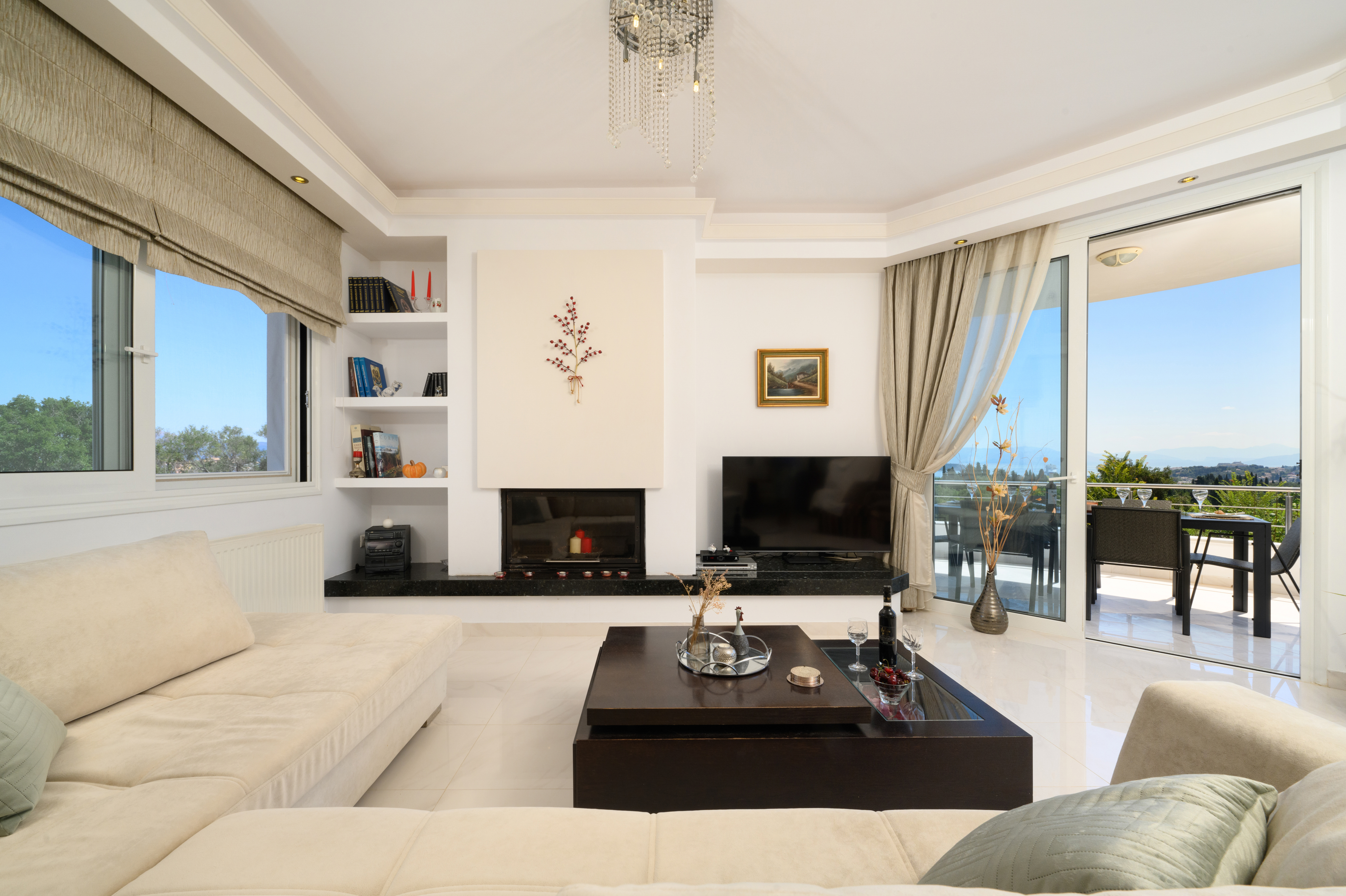 Bright living room with comfortable seating inside Olga’s Luxury Villa Corfu