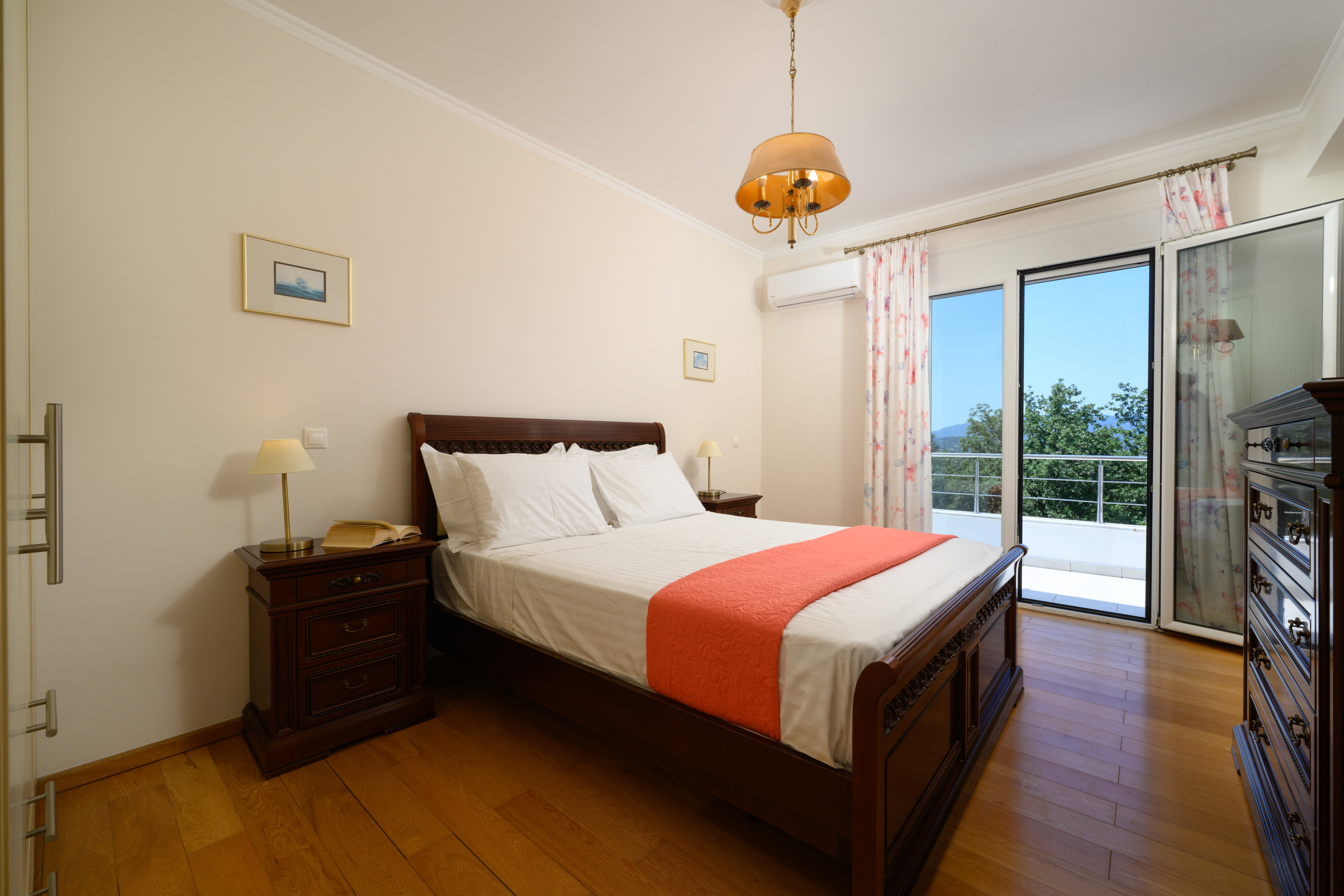 Luxury master bedroom with comfortable bed in Corfu holiday villa