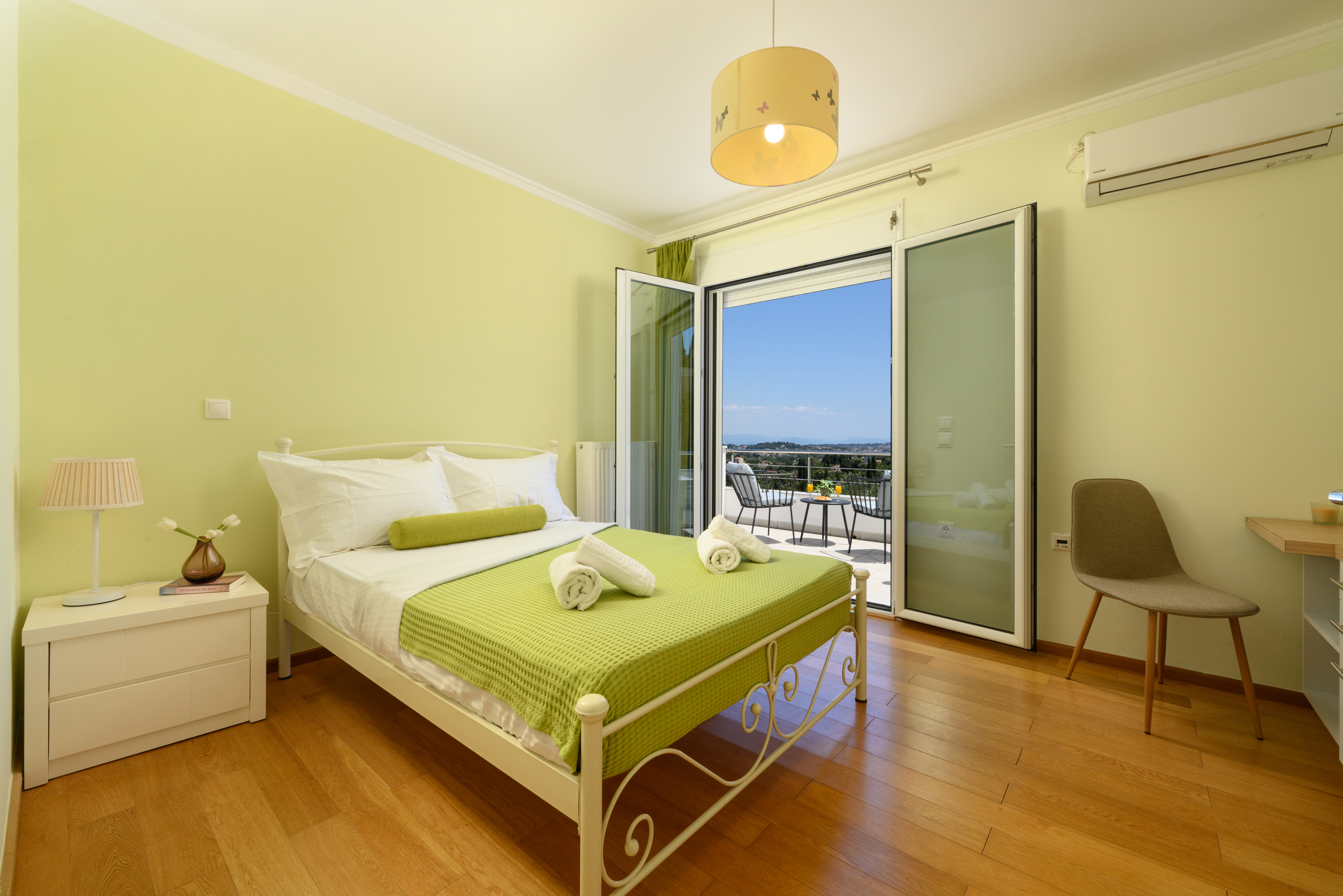 Comfortable guest bedroom inside Olga’s Luxury Villa Corfu