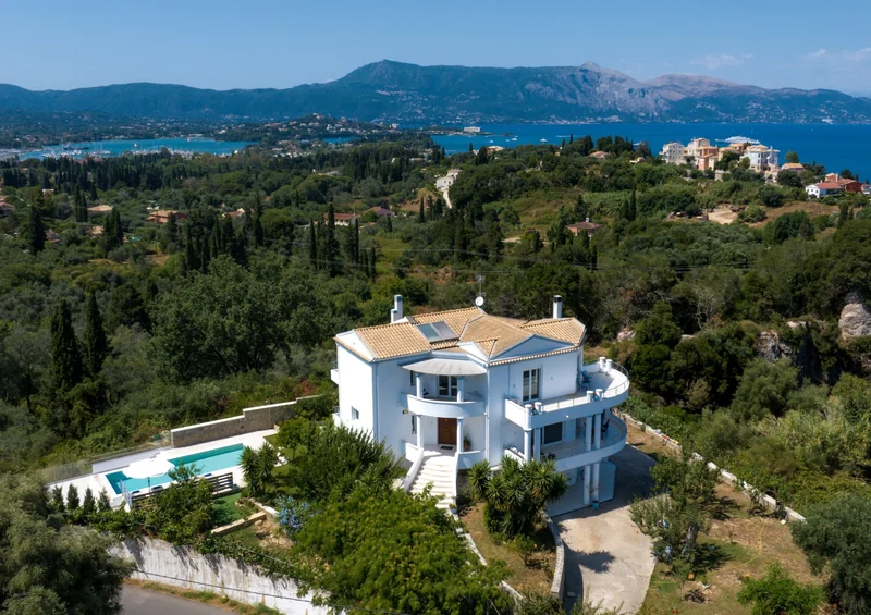 Aerial view of Olga’s Luxury Villa in Corfu with private infinity pool and panoramic sea view